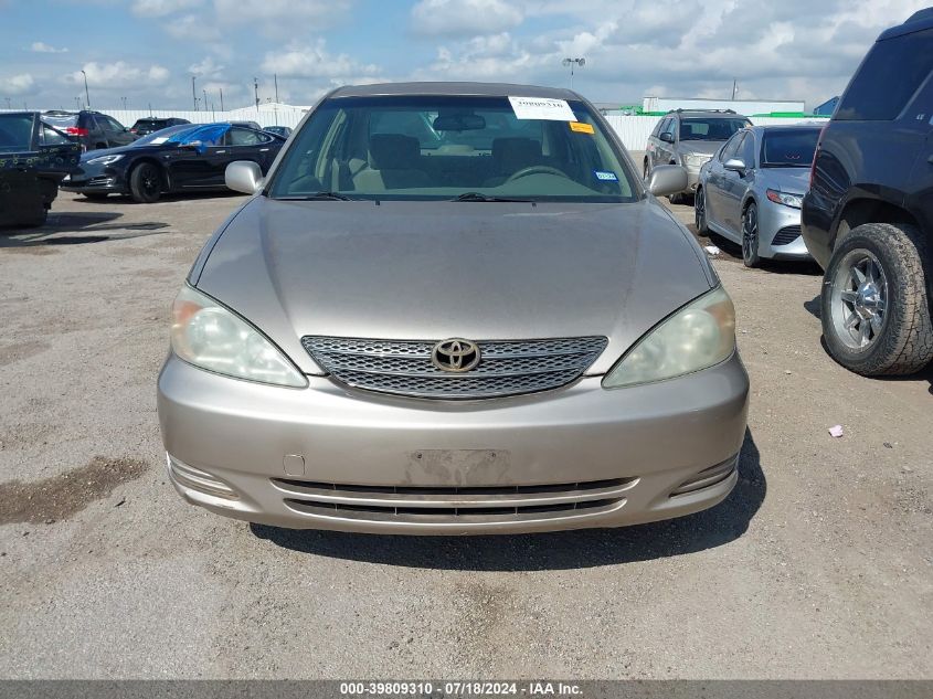 2002 Toyota Camry Le VIN: JTDBE32K020067632 Lot: 39809310