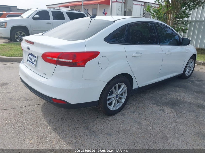 2018 Ford Focus Se VIN: 1FADP3F24JL259460 Lot: 39809326
