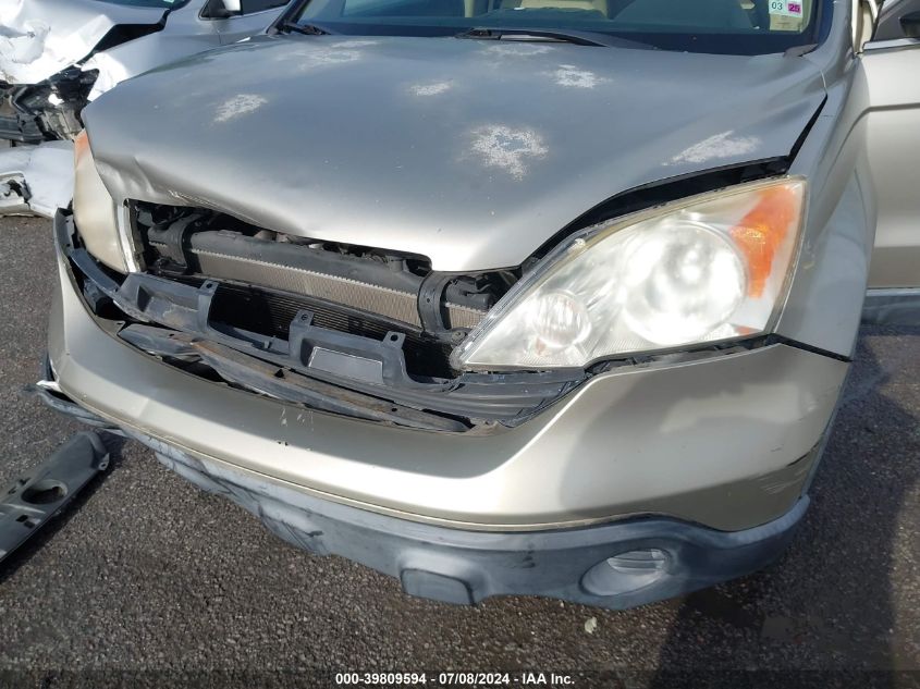 2007 Honda Cr-V Lx VIN: JHLRE38397C074120 Lot: 39809594