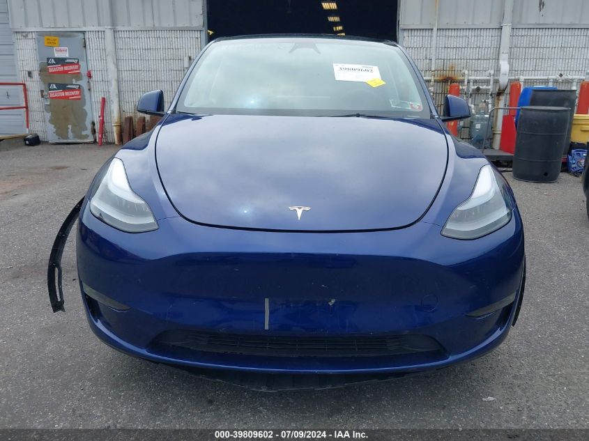 2023 Tesla Model Y Awd/Performance Dual Motor All-Wheel Drive VIN: 7SAYGDEF6PF834257 Lot: 39809602