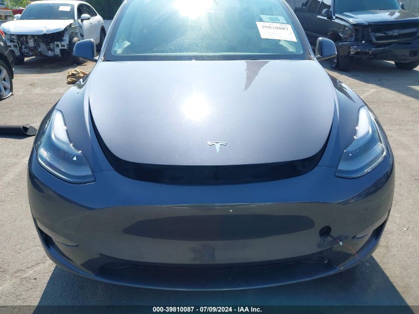 2022 Tesla Model Y Long Range Dual Motor All-Wheel Drive VIN: 7SAYGAEE6NF489671 Lot: 39810087