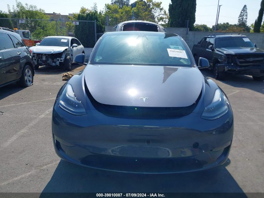 2022 Tesla Model Y Long Range Dual Motor All-Wheel Drive VIN: 7SAYGAEE6NF489671 Lot: 39810087