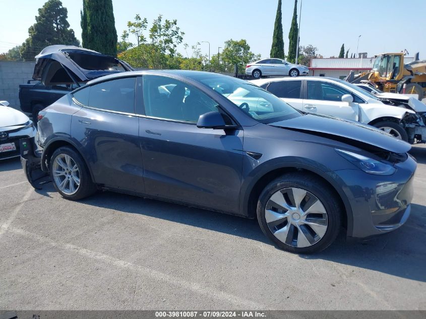 2022 Tesla Model Y Long Range Dual Motor All-Wheel Drive VIN: 7SAYGAEE6NF489671 Lot: 39810087