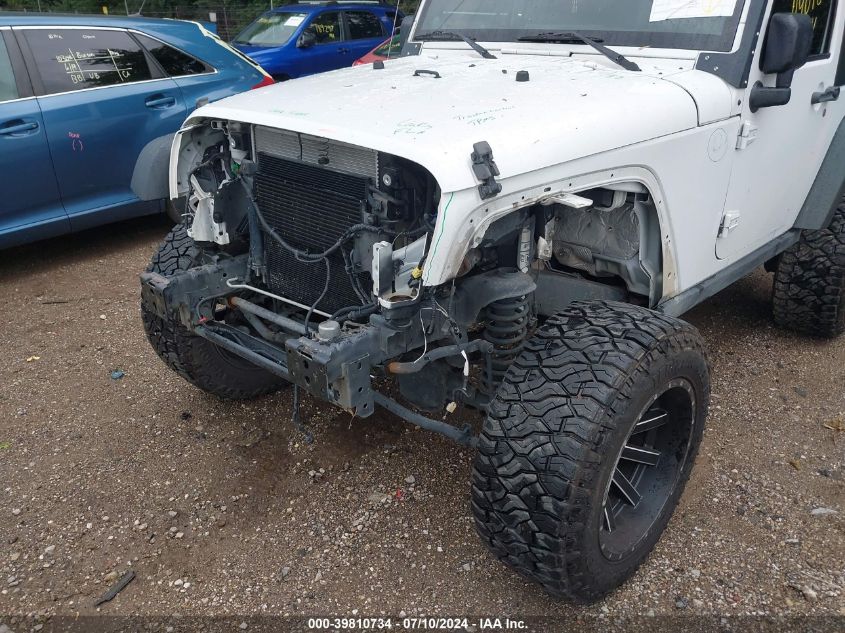 2012 Jeep Wrangler Sport VIN: 1C4AJWAGXCL263602 Lot: 39810734