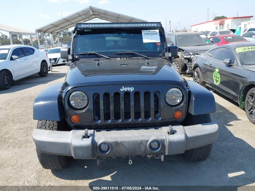 2013 Jeep Wrangler Unlimited Sahara VIN: 1C4HJWEG2DL671232 Lot: 39811010