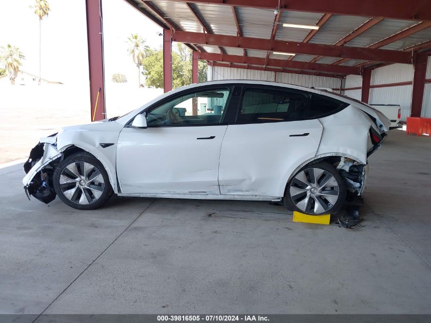 2023 Tesla Model Y Awd/Long Range Dual Motor All-Wheel Drive VIN: 7SAYGDEE1PF738088 Lot: 39816505