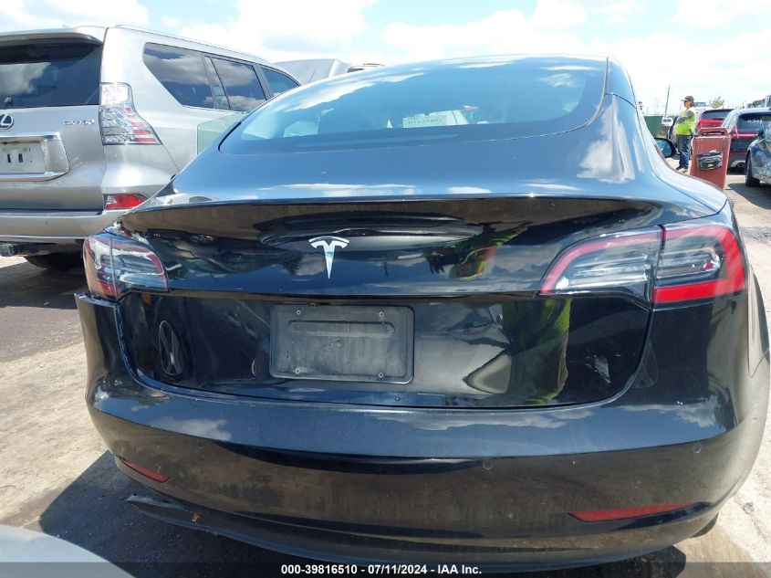 2021 Tesla Model 3 Standard Range Plus Rear-Wheel Drive VIN: 5YJ3E1EA2MF068412 Lot: 39816510