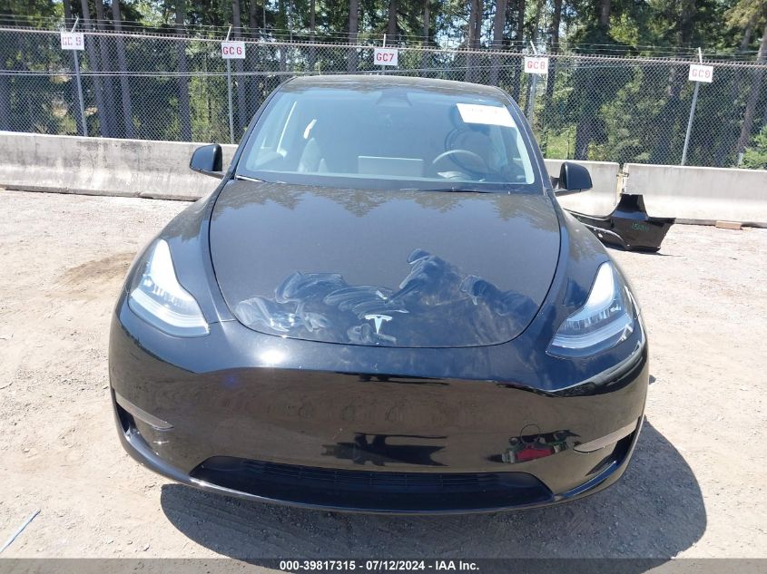 2023 Tesla Model Y Awd/Long Range Dual Motor All-Wheel Drive VIN: 7SAYGDEE3PF590171 Lot: 39817315