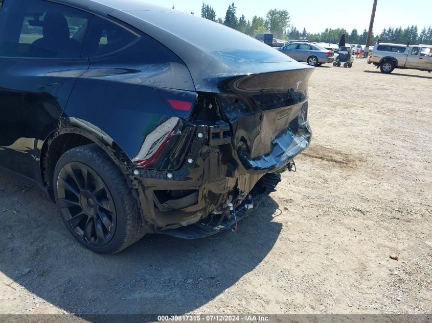 2023 Tesla Model Y Awd/Long Range Dual Motor All-Wheel Drive VIN: 7SAYGDEE3PF590171 Lot: 39817315