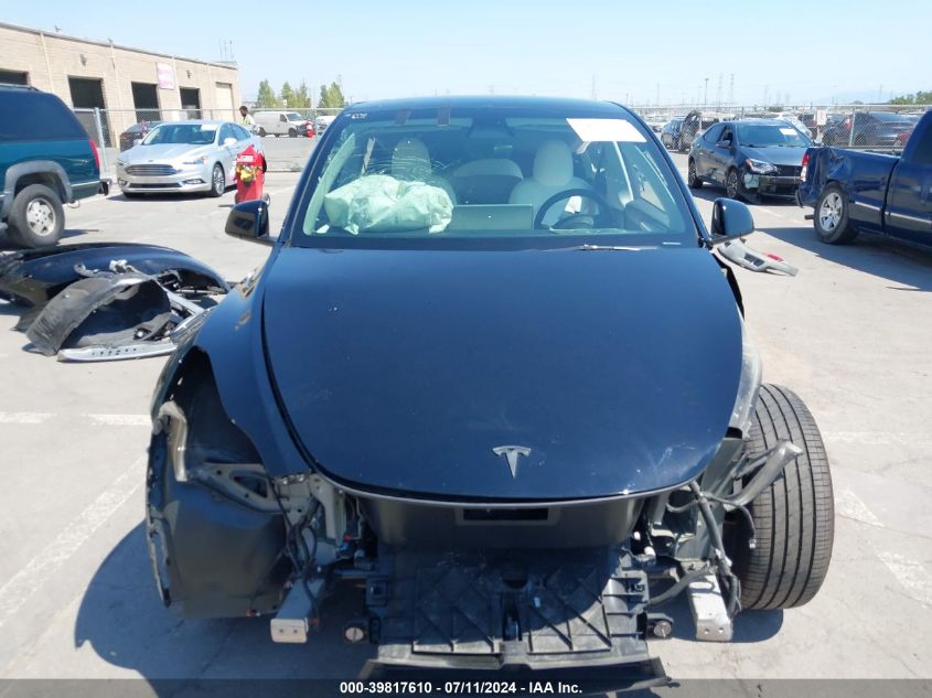 2023 Tesla Model Y Awd/Long Range Dual Motor All-Wheel Drive VIN: 7SAYGDEE4PF753832 Lot: 39817610