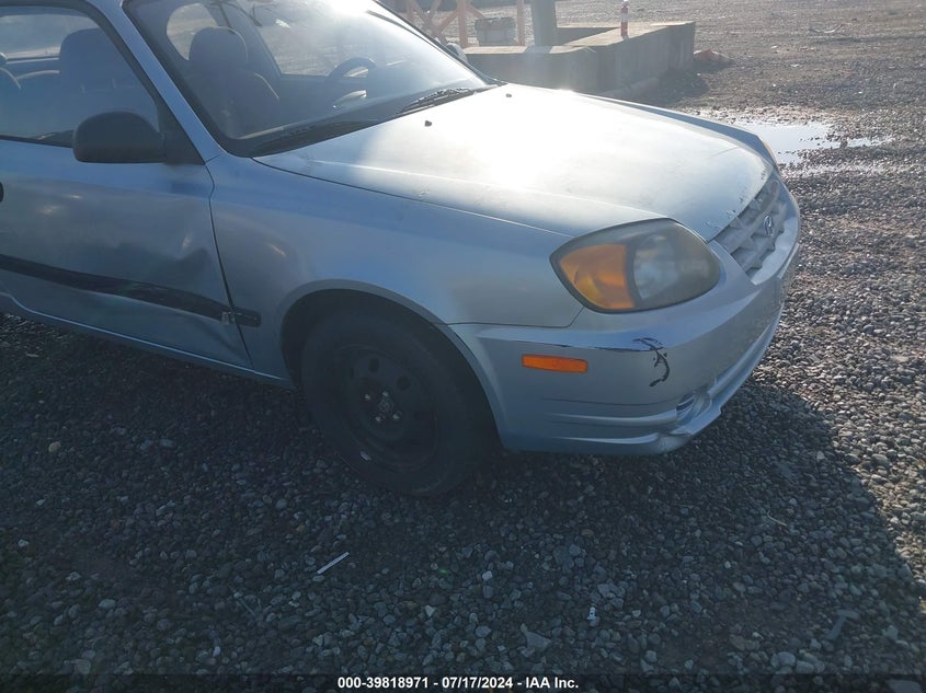 2003 Hyundai Accent L VIN: KMHCF35C03U236530 Lot: 39818971