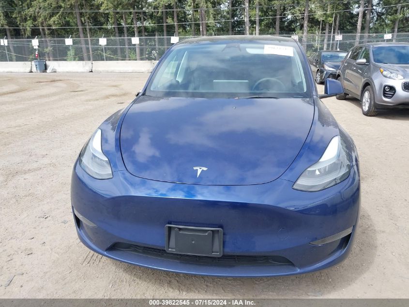 2023 Tesla Model Y Awd/Long Range Dual Motor All-Wheel Drive VIN: 7SAYGAEE8PF665249 Lot: 39822545