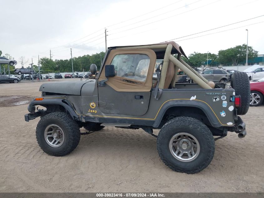 1990 Jeep Wrangler / Yj Sahara VIN: 2J4FY49T9LJ521020 Lot: 39823416