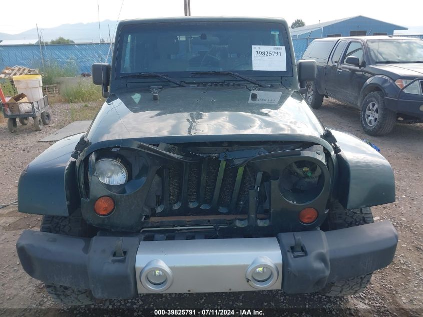 2010 Jeep Wrangler Sahara VIN: 1J4AA5D1XAL222542 Lot: 39825791