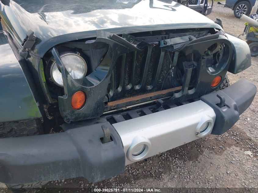 2010 Jeep Wrangler Sahara VIN: 1J4AA5D1XAL222542 Lot: 39825791