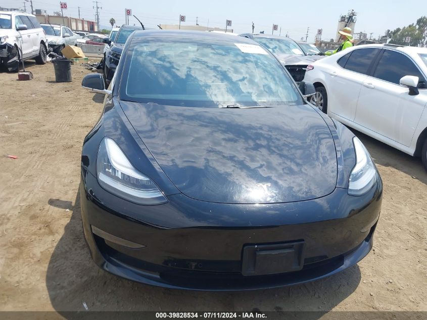 2018 Tesla Model 3 Long Range/Mid Range VIN: 5YJ3E1EA5JF176065 Lot: 39828534