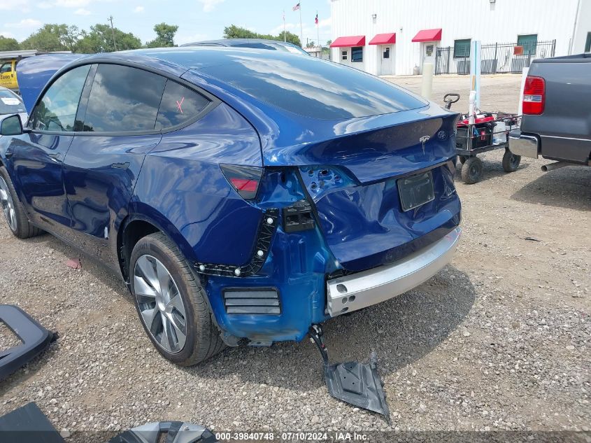 2023 Tesla Model Y Awd/Long Range Dual Motor All-Wheel Drive VIN: 7SAYGDEE2PF885715 Lot: 39840748