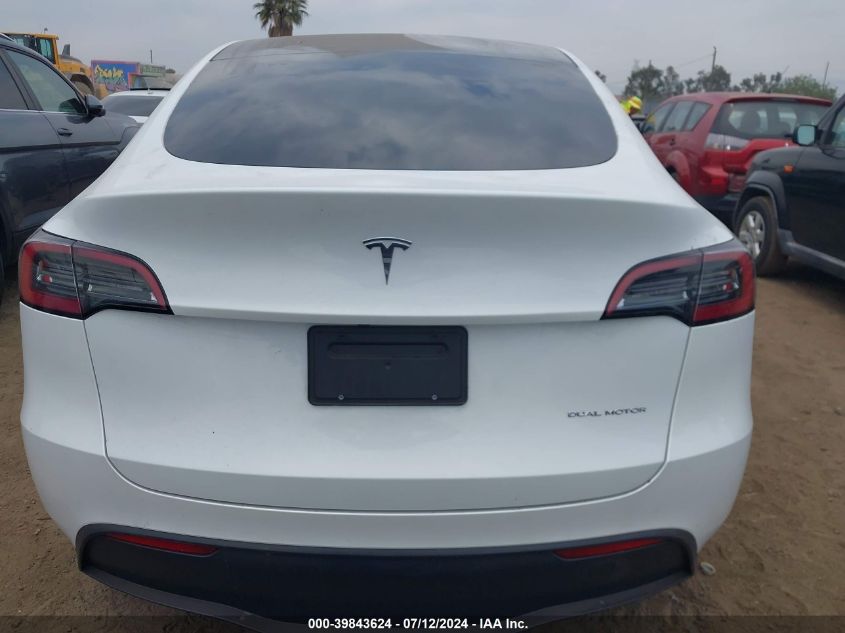 2023 Tesla Model Y Awd/Long Range Dual Motor All-Wheel Drive VIN: 7SAYGDEE7PF607182 Lot: 39843624