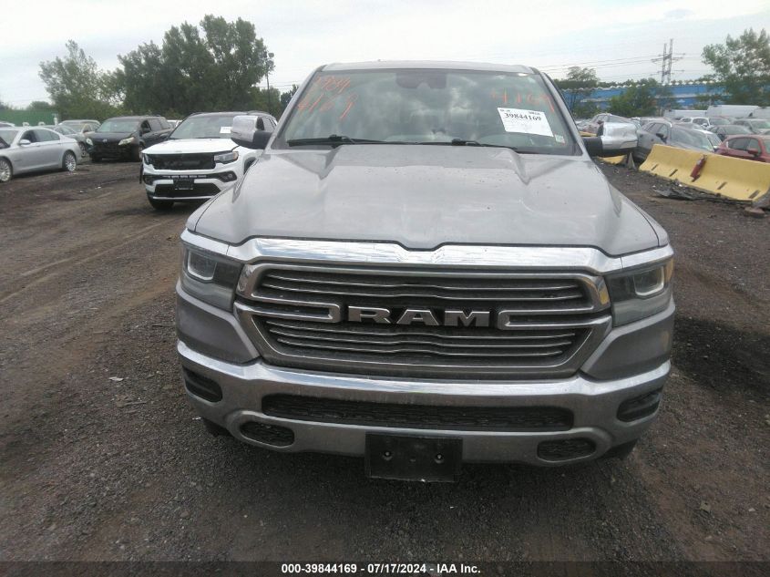 2021 Ram 1500 Laramie Quad Cab 4X4 6'4 Box VIN: 1C6SRFDT0MN715012 Lot: 39844169