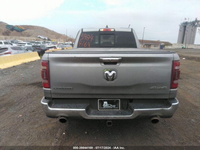 2021 Ram 1500 Laramie Quad Cab 4X4 6'4 Box VIN: 1C6SRFDT0MN715012 Lot: 39844169