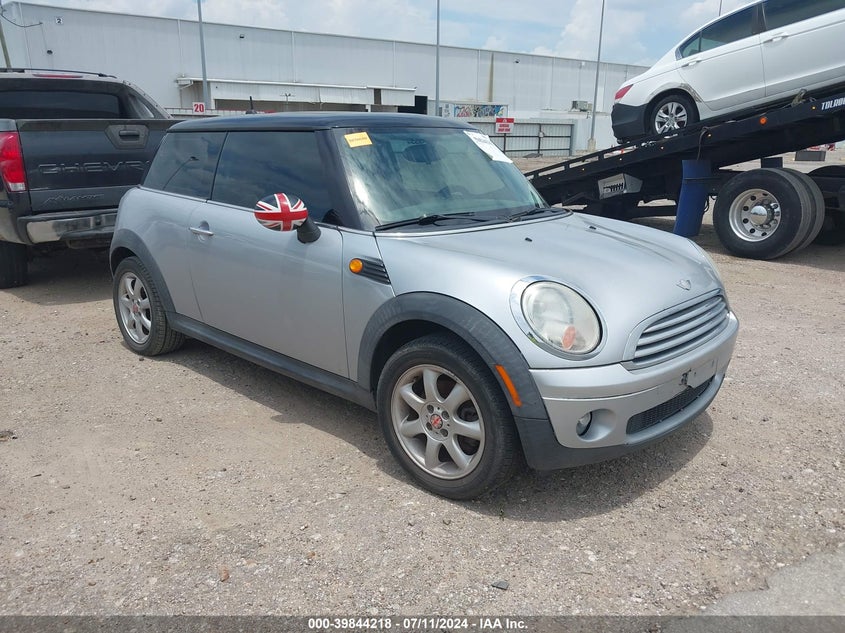 2007 Mini Cooper grey hatchback gasoline WMWMF33567TT55320 photo #1
