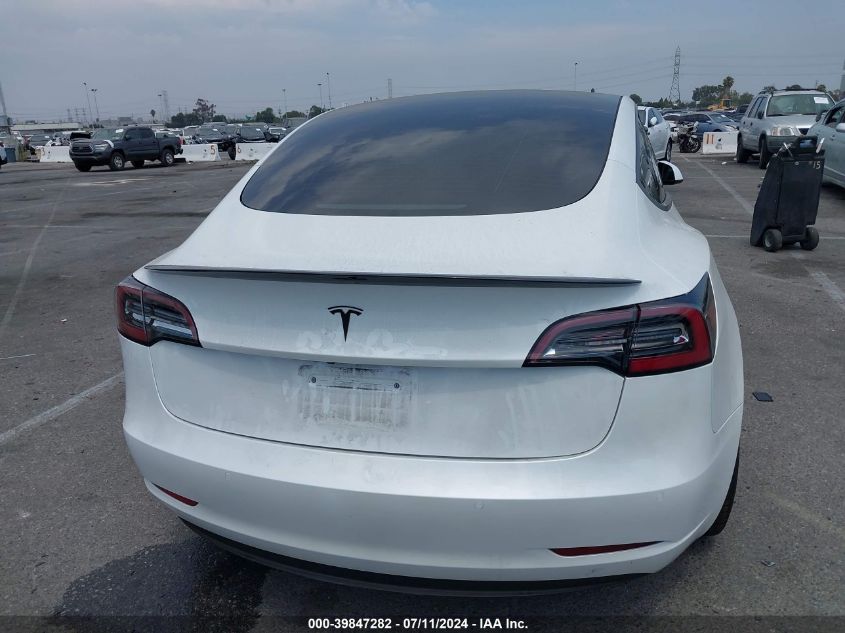 2021 Tesla Model 3 Standard Range Plus Rear-Wheel Drive VIN: 5YJ3E1EA6MF002722 Lot: 39847282