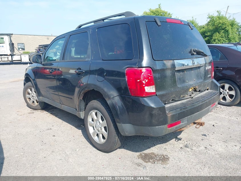 2011 Mazda Tribute Touring VIN: 4F2CY9C70BKM00750 Lot: 39847925