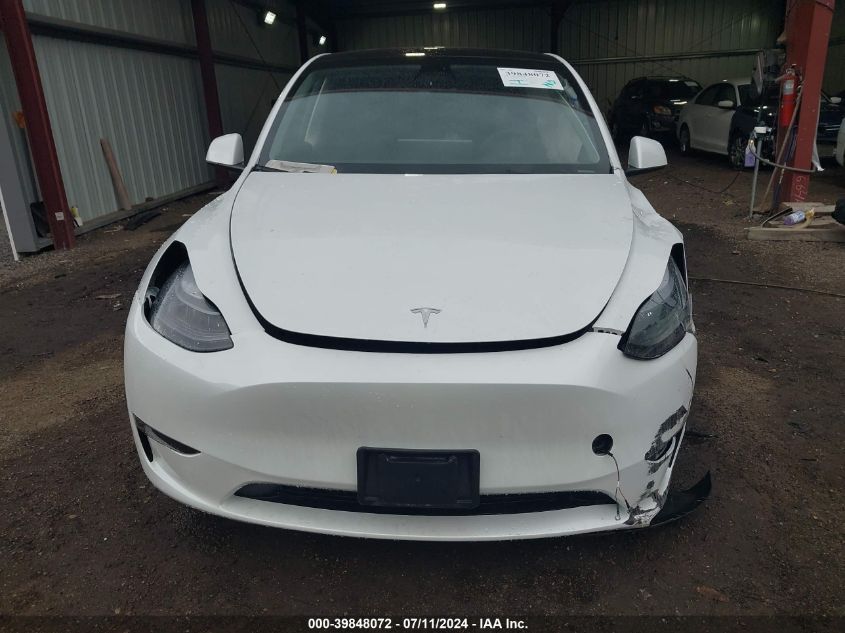 2023 Tesla Model Y Awd/Long Range Dual Motor All-Wheel Drive VIN: 7SAYGDEEXPF765287 Lot: 39848072