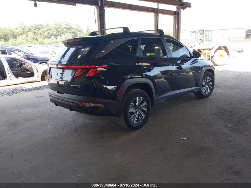 VIN KM8JBCA19NU072754 2022 HYUNDAI TUCSON HYBRID BLUE