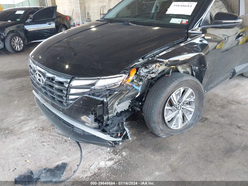 VIN KM8JBCA19NU072754 2022 HYUNDAI TUCSON HYBRID BLUE