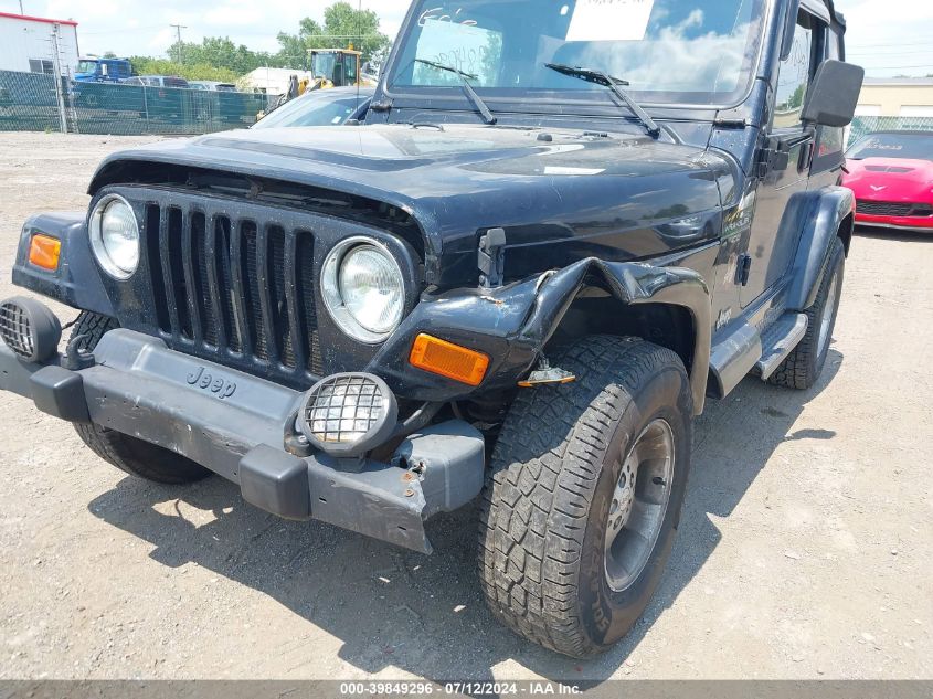 2000 Jeep Wrangler Sahara VIN: 1J4FA59S2YP753292 Lot: 39849296