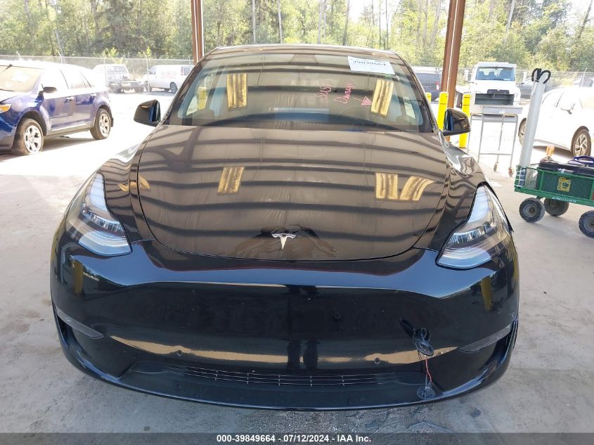 2021 Tesla Model Y VIN: 5YJYGAEE7MF128672 Lot: 39849664