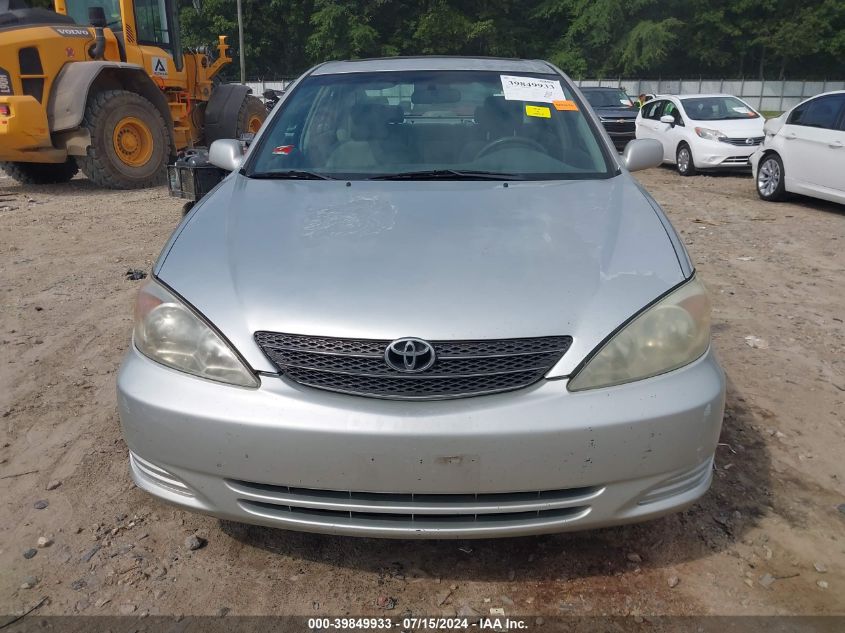 2003 Toyota Camry Le VIN: 4T1BE32K63U664774 Lot: 39849933