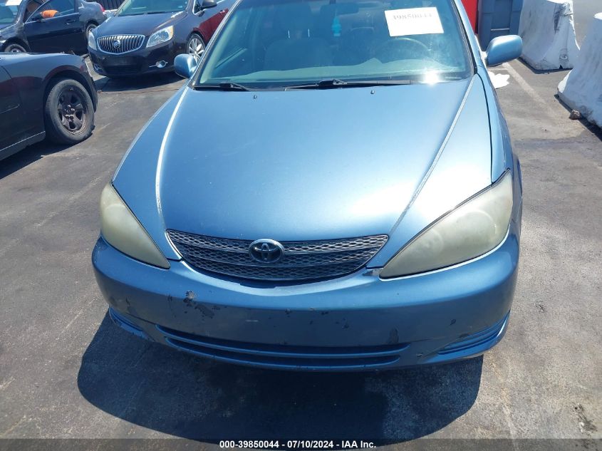 2003 Toyota Camry Le VIN: JTDBE32K830176583 Lot: 39850044