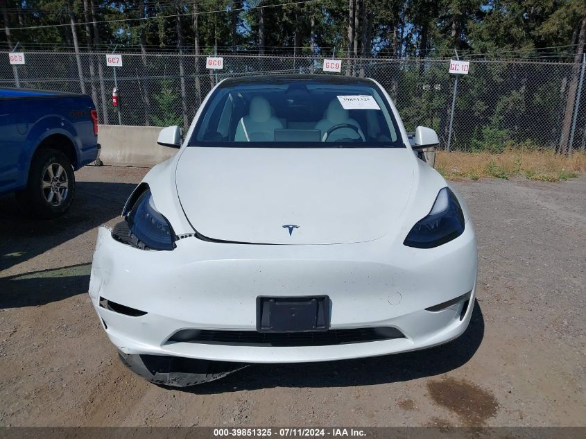 2023 Tesla Model Y Awd/Long Range Dual Motor All-Wheel Drive VIN: 7SAYGDEE4PF751224 Lot: 39851325