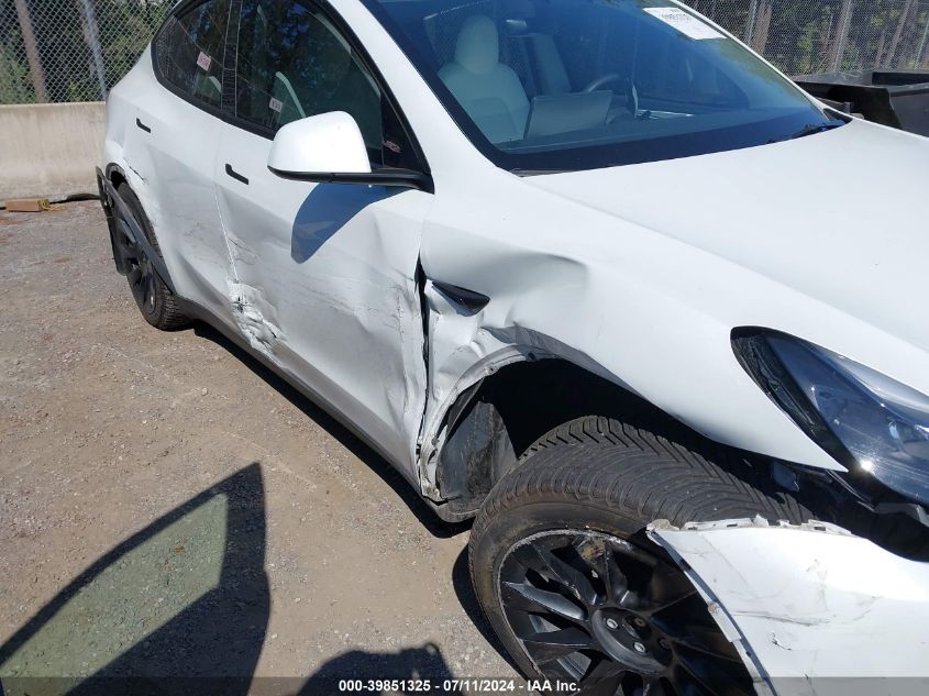 2023 Tesla Model Y Awd/Long Range Dual Motor All-Wheel Drive VIN: 7SAYGDEE4PF751224 Lot: 39851325