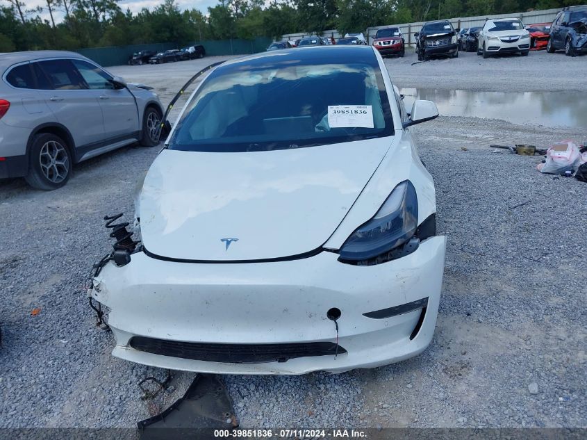 2022 Tesla Model 3 Long Range Dual Motor All-Wheel Drive VIN: 5YJ3E1EB5NF332779 Lot: 39851836