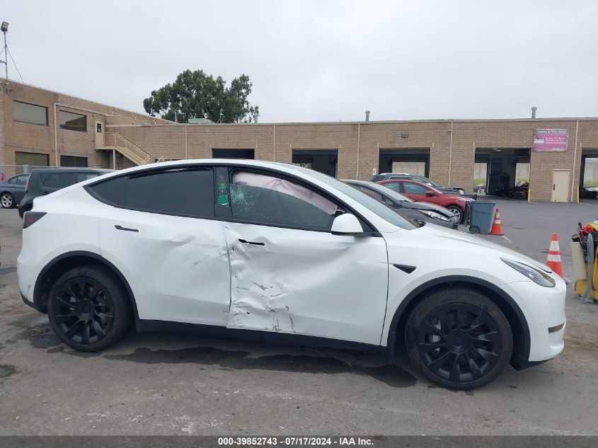 2023 Tesla Model Y Awd/Long Range Dual Motor All-Wheel Drive VIN: 7SAYGDEE4PF751899 Lot: 39852743