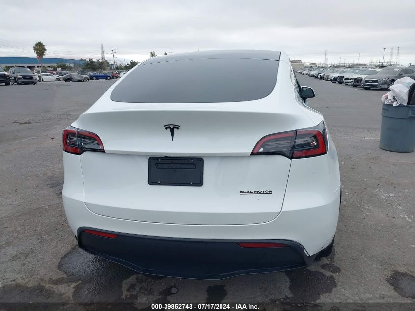 2023 Tesla Model Y Awd/Long Range Dual Motor All-Wheel Drive VIN: 7SAYGDEE4PF751899 Lot: 39852743