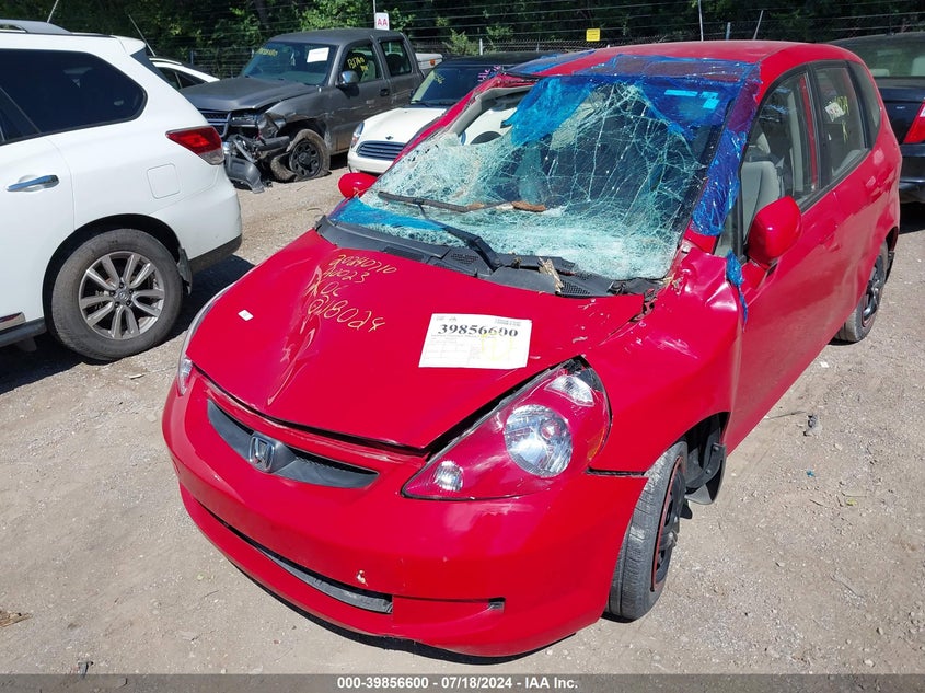 2007 Honda Fit VIN: JHMGD38427S018024 Lot: 39856600