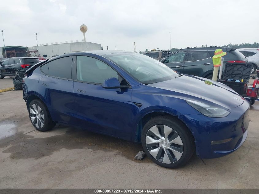 2023 Tesla Model Y Awd/Long Range Dual Motor All-Wheel Drive VIN: 7SAYGAEE9PF869381 Lot: 39857223