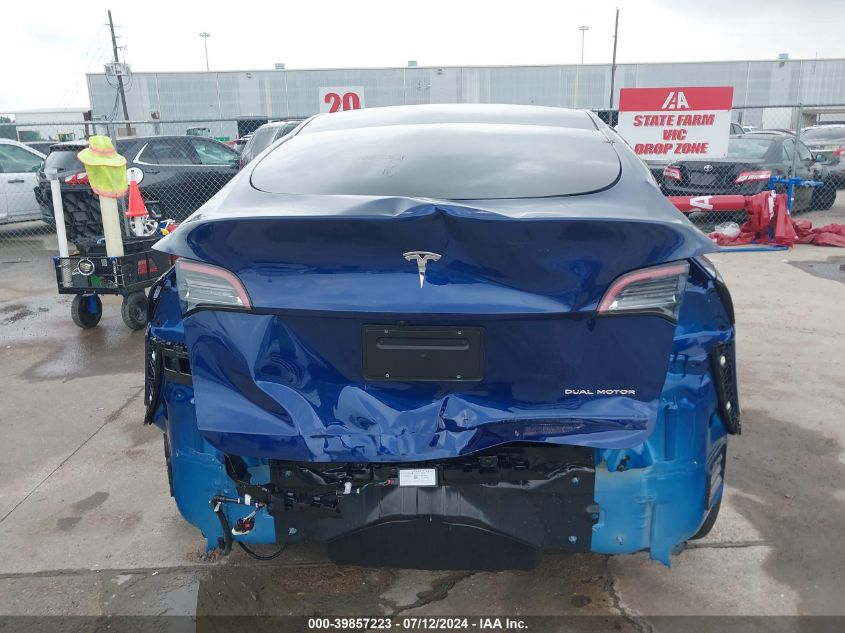 2023 Tesla Model Y Awd/Long Range Dual Motor All-Wheel Drive VIN: 7SAYGAEE9PF869381 Lot: 39857223