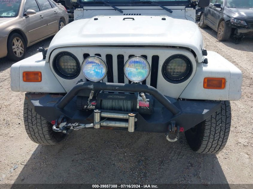 2000 Jeep Wrangler Sahara VIN: 1J4FA59S0YP803610 Lot: 39857388
