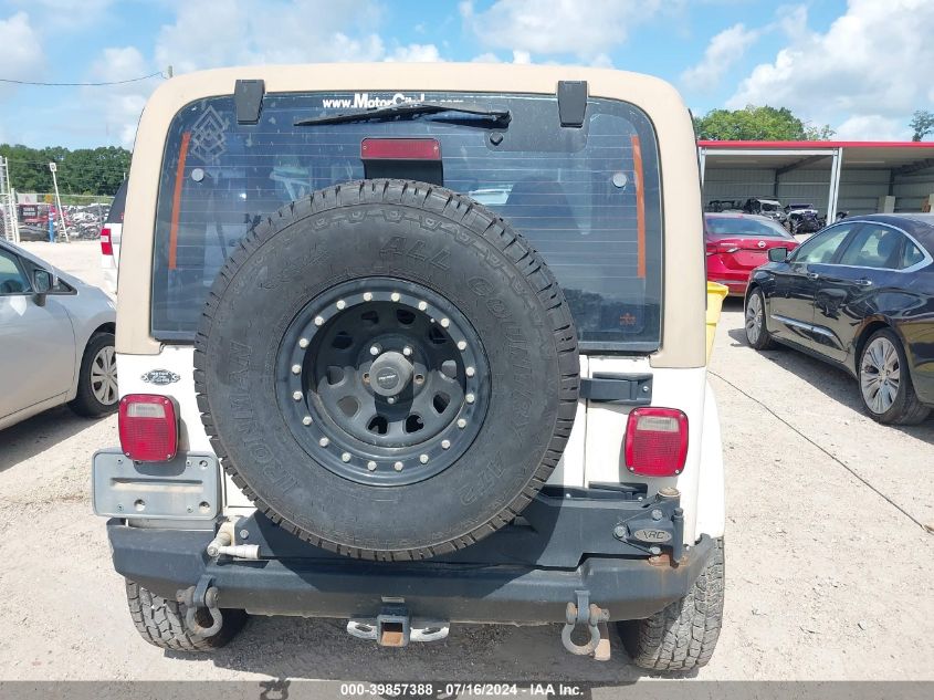 2000 Jeep Wrangler Sahara VIN: 1J4FA59S0YP803610 Lot: 39857388