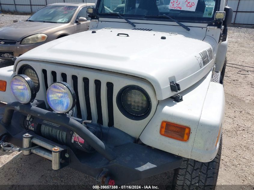 2000 Jeep Wrangler Sahara VIN: 1J4FA59S0YP803610 Lot: 39857388