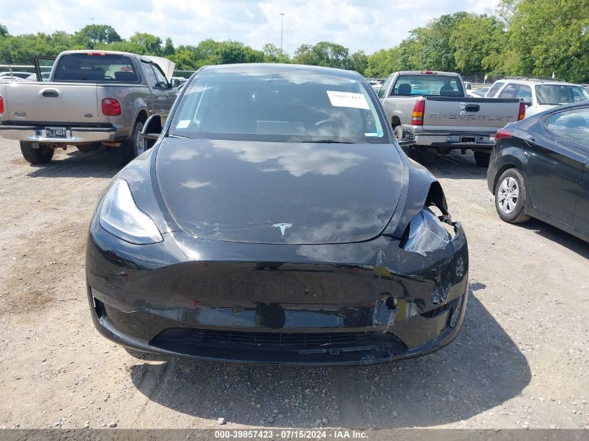 2023 Tesla Model Y Rwd VIN: 7SAYGDED8PF956018 Lot: 39857423