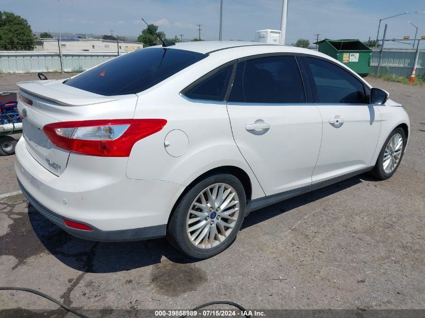 2013 Ford Focus Titanium VIN: 1FADP3J2XDL184176 Lot: 39858989