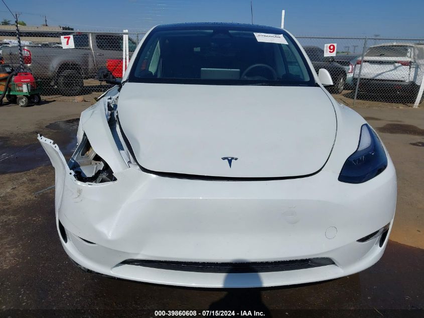 2023 Tesla Model Y Awd/Long Range Dual Motor All-Wheel Drive VIN: 7SAYGDEE0PF824198 Lot: 39860608