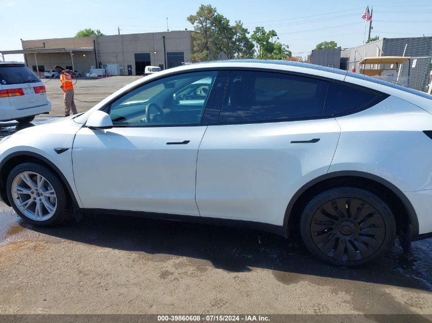 2023 Tesla Model Y Awd/Long Range Dual Motor All-Wheel Drive VIN: 7SAYGDEE0PF824198 Lot: 39860608