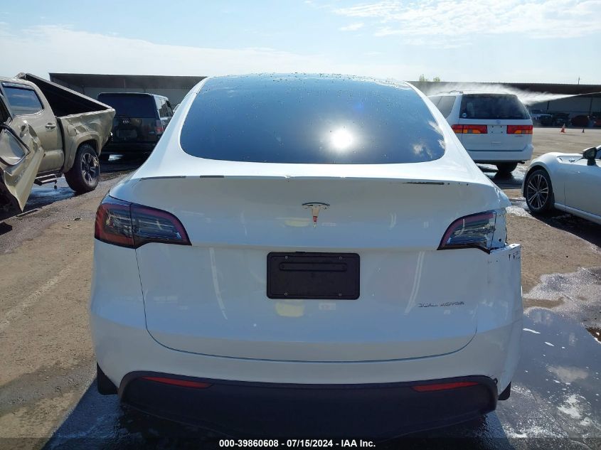 2023 Tesla Model Y Awd/Long Range Dual Motor All-Wheel Drive VIN: 7SAYGDEE0PF824198 Lot: 39860608